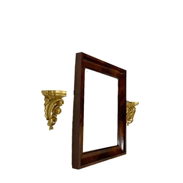Small mahogany mirror with gilt wood rocaille scroll wall brackets Small mirror with 2 miniature wall brackets in carved...