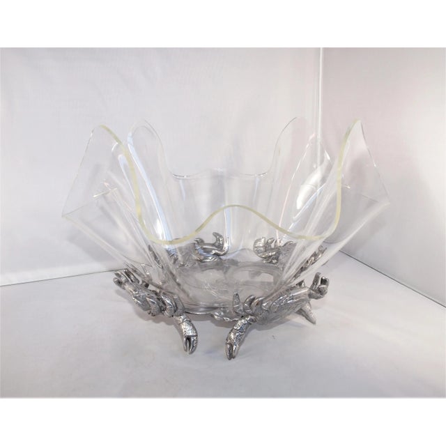 An Arthur Court acrylic bowl with aluminum base in the form of ocean crabs. Bowl is separate from base and is indented on...