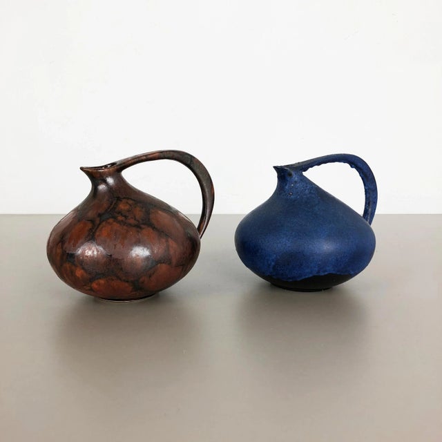 Set of 2 vases Design: Kurt Tschörner Producer: Ruscha, Germany Decade: 1960s Description: This original vintage vase set...