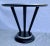 Here is a wonderfully fun Art Deco inspired table from the 1980's. The table has a demi-lune shape, with a flat backside...