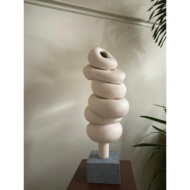 Modder Transforming Ceramic Sculpture by Françoise Jeffrey Dimensions: W 25 x 62 cm Materials: earthenware, year 2024, off...