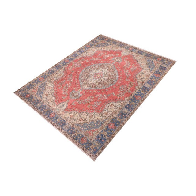Enhance your living space with this stunning vintage Persian hand-knotted wool rug, a true showstopper that effortlessly...