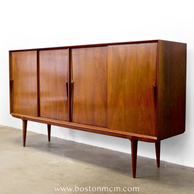 Dimensions: 78 3/4" L x 18” D x 43 1/2” H Origin: Denmark Designer: Gunni Omann Manufacturer: Omann Jun. Møbelfabrik Year:...