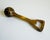 Vintage 1970s brass golf ball bottle opener with nice weight in hand. Perfect for gifting. Unmarked.