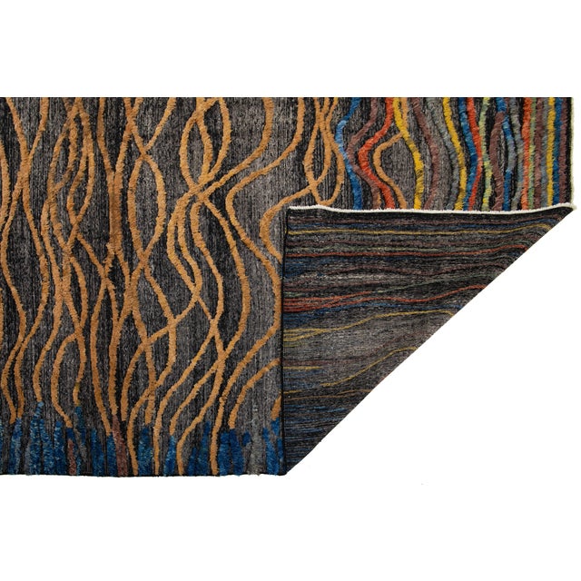 Transform your living space with this Modern Moroccan Style Wool Rug. Handcrafted with care, it features a vibrant...