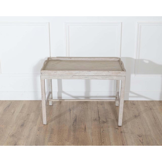 This charming Swedish tray table, dating to circa 1920, combines practical functionality with understated Scandinavian...