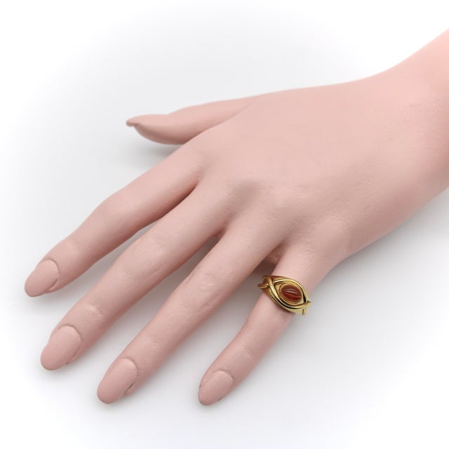 This stunning vintage Tiffany & Co. ring, which has a crossover element that centers around an oval citrine cabochon,...