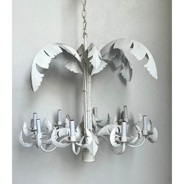 Exude the effortless glamour of a mid-century estate with this stunning vintage palm tree chandelier. A quintessential...