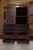 19th Century Chinese Red Lacquer Wedding Cabinet A striking antique Chinese wedding cabinet finished in rich red lacquer...