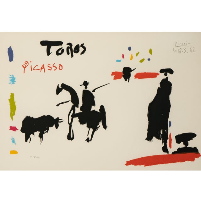 A vibrant and iconic color lithograph from Picasso’s celebrated Toros y Toreros series, this piece captures the artist’s...