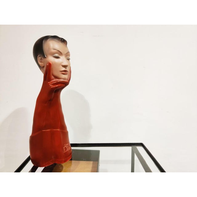 Beautiful and intruiging advertising statue for Christian Dior. This would have been used on a shop counter or to draw...