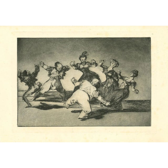Disparate alegre - from Los Proverbios is an original black and white etching realized by Francisco Goya (1746-1828). The...