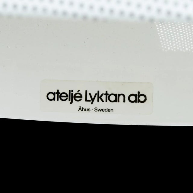 - Designed 1982 by Hans Philip Zachau for Ateljé Lyktan - Perforated steel white painted with wood in the middle - Fitted...