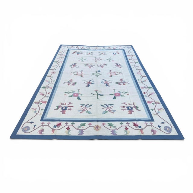 This oversize handmade Indian dhurrie (flatweave kilim-style) rug is a celebration of simplicity, craftsmanship, and soft,...