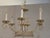 Design Plus Gallery present the Epergne Chandelier from Lamplight Designs. The light fixture is made of metal with a light...