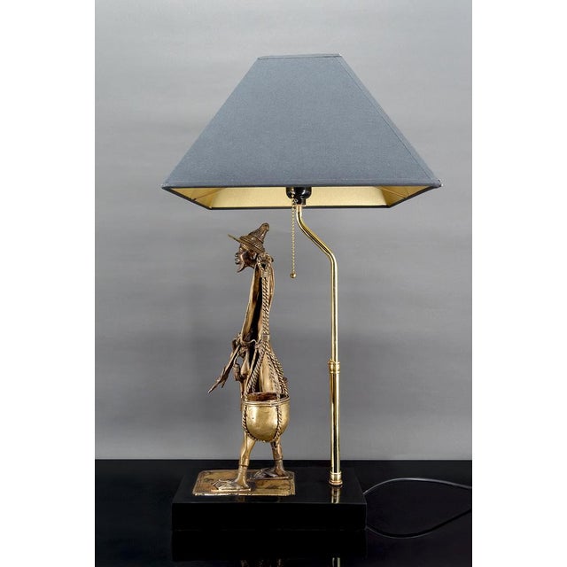 Superb bronze lamp. peul / fula african bronze and black resin base. bronze from africa and lamp assembly in france, circa...