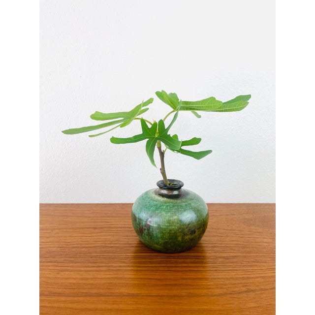 Vintage 1970s Handmade Stoneware Vase handmade made of a stoneware type material green color with black accents signed...