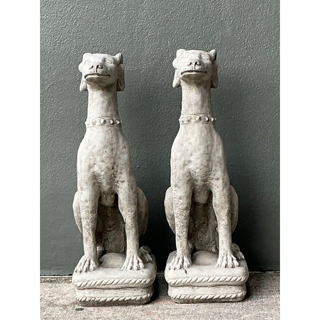 This stately pair of vintage cast concrete hounds captures the noble and lean elegance of the greyhound form with...