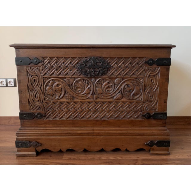 About Nice 17th century chest in brown chesnut. Hand carved facade panel with geometrics decorations. Plinth with brace...
