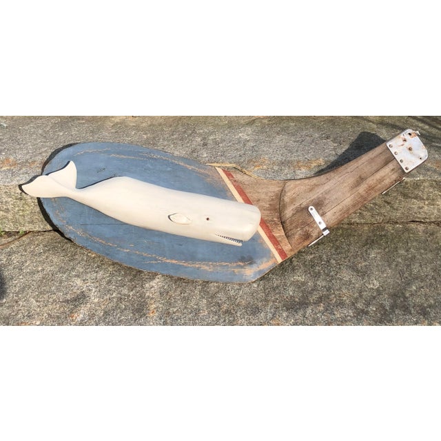 Here is a well made vintage Americanna white whale carving on a custom- made rudder . It is a custom made and signed by...