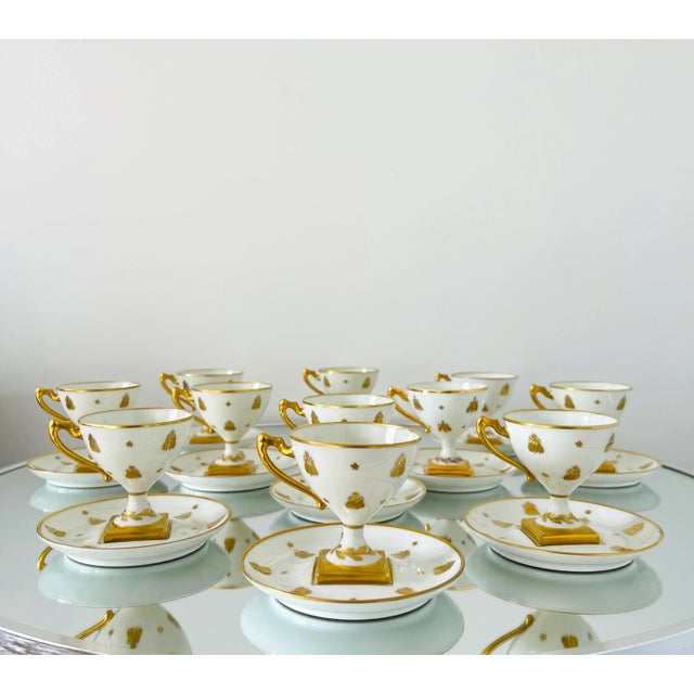 Exquisite Neoclassical demitasse set comprised of fine porcelain and 24K gold by Camille Le Tallec. The pattern is from...