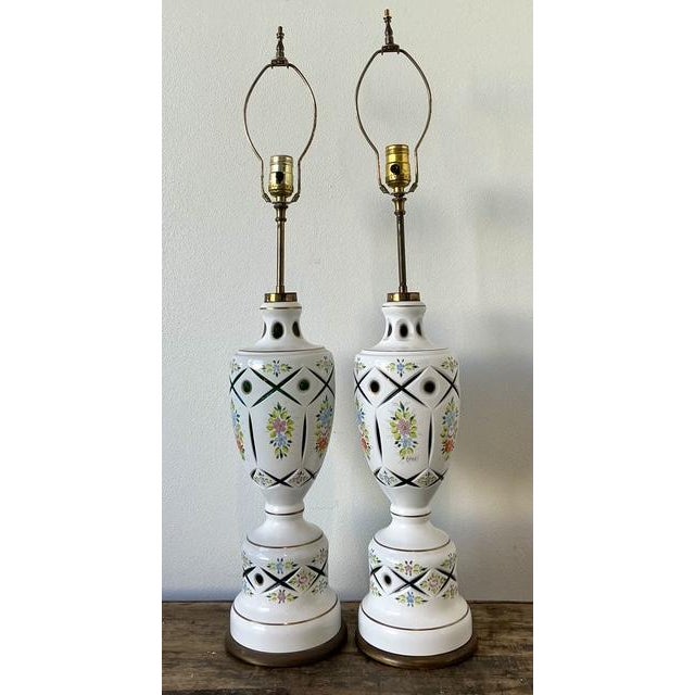 This exquisite pair of vintage table lamps exudes Hollywood Regency glamour through masterful craftsmanship and delicate...