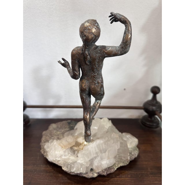 A bronze sculpture on a transparent quartz base. Unique work by Simone di Gesaro. Title: Dance step. The sculpture is cast...