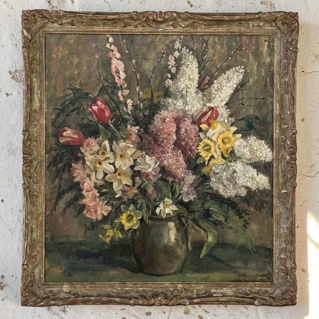 A beautifully painted floral still life by Belgian artist Jos Callaerts (1896–1965), depicting an abundant bouquet of...
