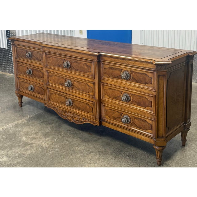 Stunning nine drawers dress by Karges. Impeccable craftsmanship synonymous with Karges - features a string burled walnut...