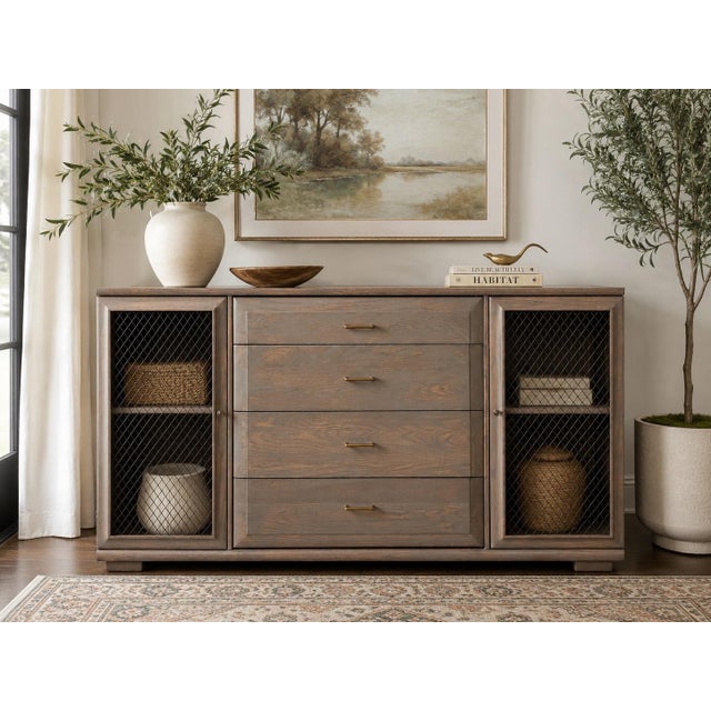 Bring timeless vintage craftsmanship into your home with this beautifully refinished Mengel credenza. Featuring a warm...