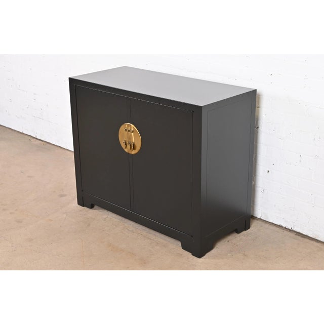 A gorgeous mid-century modern Hollywood Regency Chinoiserie buffet server or bar cabinet By Michael Taylor for Baker...