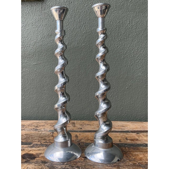 This striking pair of vintage spiral candle holders captures the sculptural elegance of mid-century modern design. Crafted...