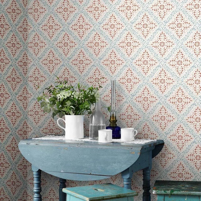 Inspired by a beautiful antique stencil pattern, Nyborg wallpaper marries boho chic with timeless charm. This product is...