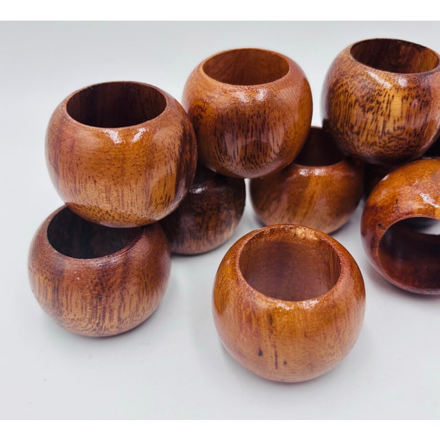 A strikingly handsome set of 12 wood napkin rings in walnut. Handcrafted. Be sure to tap the heart to favorite this item!