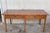 A charming early 20th century Spanish pine farm table with six legs and a wonderfully well-worn finish from a century of...