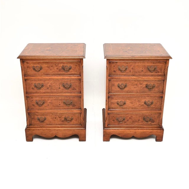 A smart and extremely well made pair of antique Georgian style burr walnut bedside chest of drawers. They were made in...