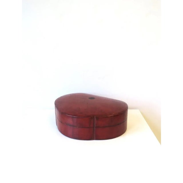 An Italian leather jewelry box with a Kelly-green velvet interior, circa early to mid-20th century, Italy. Box, with...