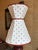 An hourglass lampshade made of white linen with embroidered chestnut polka dots and chestnut trim. Top: 10.25" across...