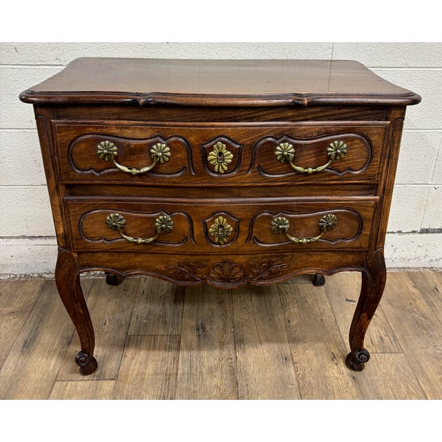This is a stunning vintage French Provincial Louis XV style carved commode, dresser, or chest of drawers. Wood appears to...