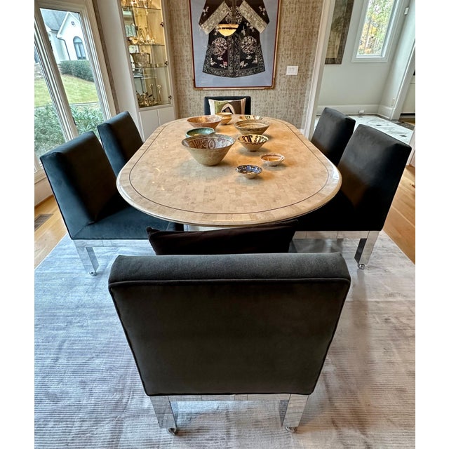 A nice set of eight cityscape dining chairs by Paul Evans for Directional, circa 1974. The set consists of two armchairs...