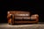 Worn leather in rich, warm brown gives this piece a comfortable and familiar look. Designed to make whoever is seated feel...