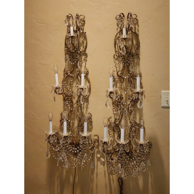 Amazing and rather rare pair of Italian gilt metal beaded sconces with macaroni style glass beads. Each one has three...
