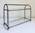 A vintage circa 1960s-1970s two-tier tabletop display shelf or etagere with an aged brass metal frame and inset glass...