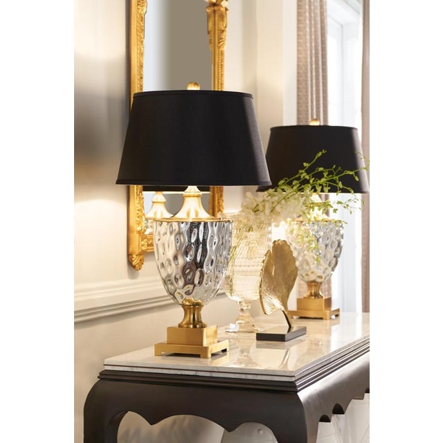Combine modern mercury glass with a classic silhouette for a one of a kind table lamp. Christopher lamp is crafted in...