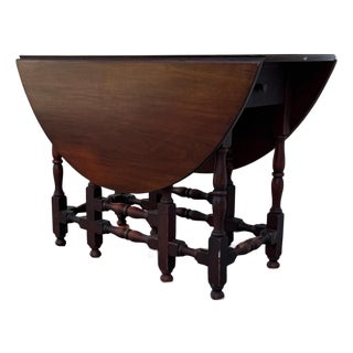 Vintage Jacobean Style Mahogany Gateleg Drop-Leaf Dining Table With Turned Stretcher Base For Sale