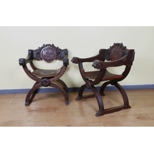 Beautiful pair of leather and wood side chairs. From the 1940s. Very good quality. In good conditions. No broken or...