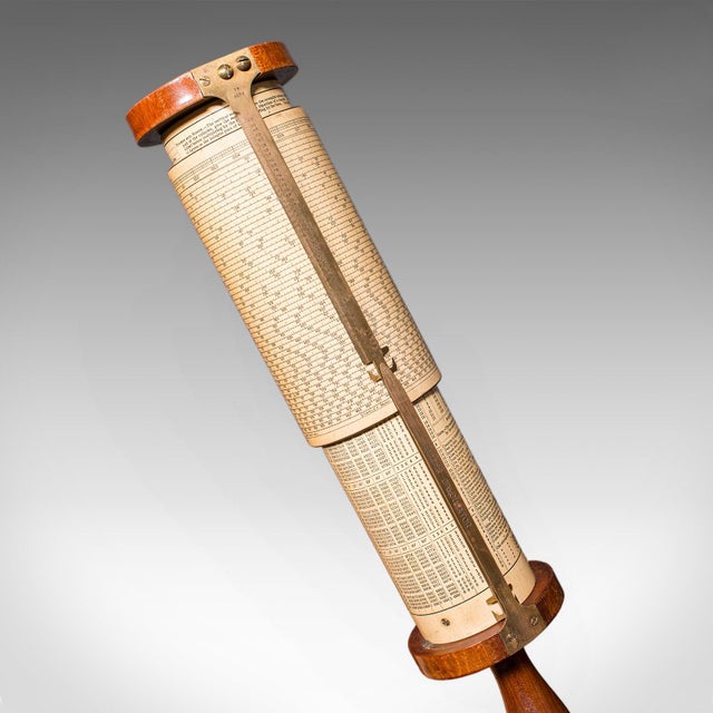 This is a vintage Fuller's Calculator. An English, beech and brass cased mathematical instrument by Stanley of London,...