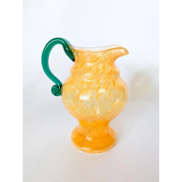 Incredible Orange swirl blown glass urn pitcher with applied green glass handle. Very unique! Likely vintage Czech...