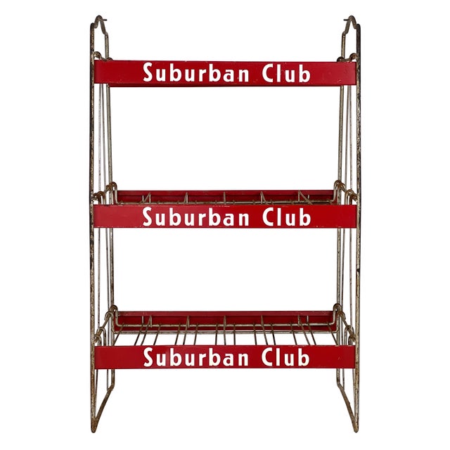Vintage 1940s industrial metal store display once used for displaying Suburban Club soda. Features wire frame construction...