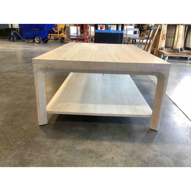 Handcrafted cocktail table from wire-brushed cursed pine with a beveled shaped cross section. Cocktail table also includes...